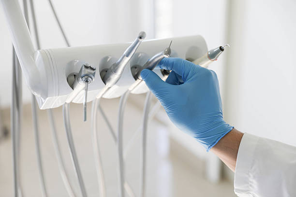 Professional Dental Implants technician working in Fredericksburg, IA